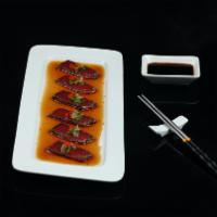 Tuna Tataki · Sliced pepper tuna with house special ponzu sauce.