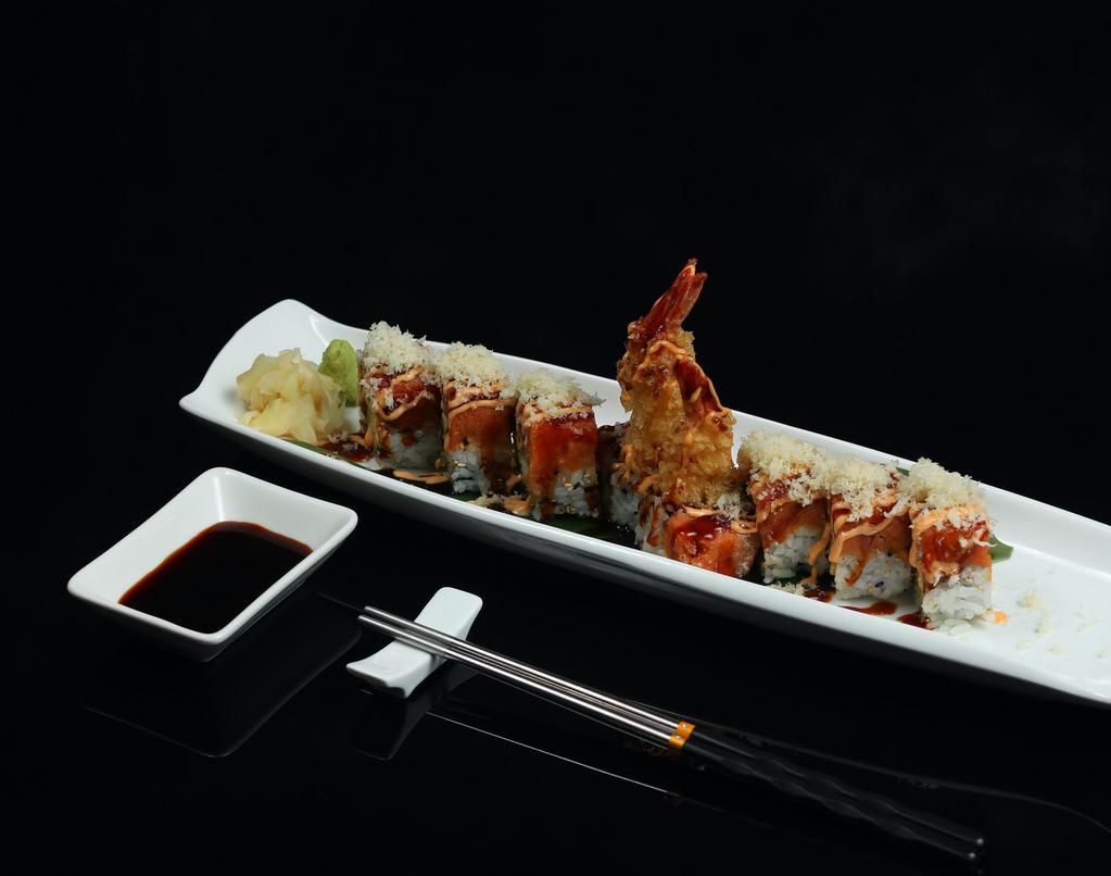 Sakura Roll · Shrimp tempura, avocado inside,topped with spicy tuna, eel sauce, spicy mayo crunch.