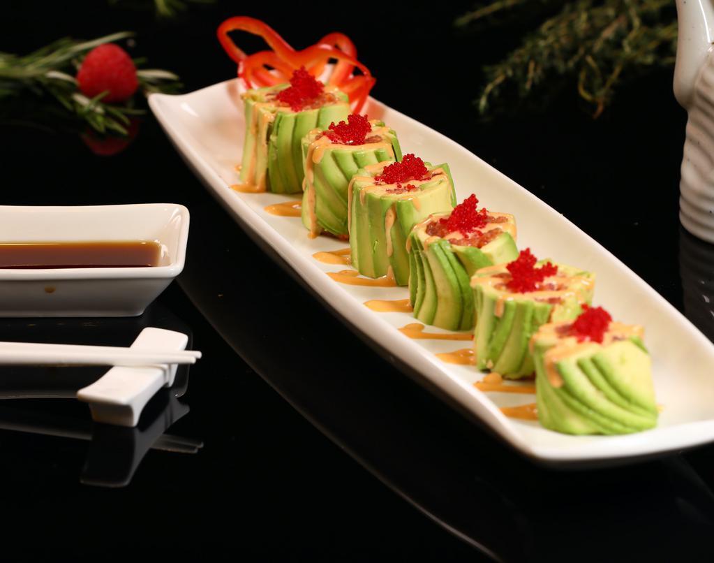 Volcano Roll · Spicy crunch tuna jalapeno inside wrapped with sliced avocado, spicy mayo, red tobiko.
