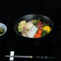 Chirashi · Served with miso soup/soda; 12 pcs assorted sashimi over rice.
