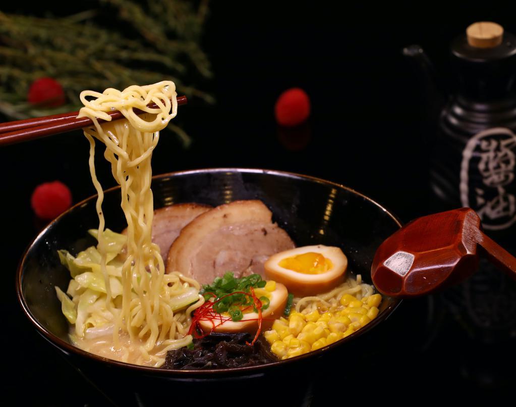 Tonkotsu Ramen · Pork chashu, wakame, nori, bamboo shoot, soft boiled egg (marinated), scallion and bean sprout.