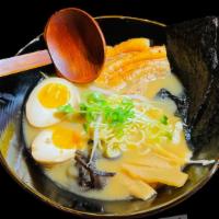 Miso Ramen · Pork chashu, wakame, nori, bamboo shoot, soft boiled egg (marinated), scallion and bean spro...