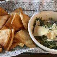 Spinach & Artichoke Dip · Vegetarian. Three-cheese blend, roasted artichokes, shallots, spinach, and pita chips.