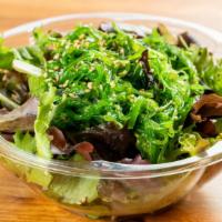 Seaweed Salad  · Spring Mix, Seaweed, Yuzu Miso, Sesame Seed, 24 0z Bowl.