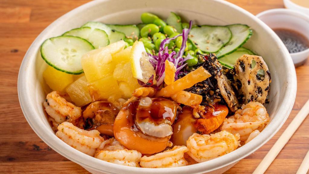 Yuzu Scallop & Shrimp  · 2 Scallops, 4 Shrimp, Red Cabbage, Cucumber, Edamame, Sweet and Green Onion, Seaweed Salad, Pineapple, Wonton Chip, Yuzu and Wasabi Dressing and Eel Sauce.