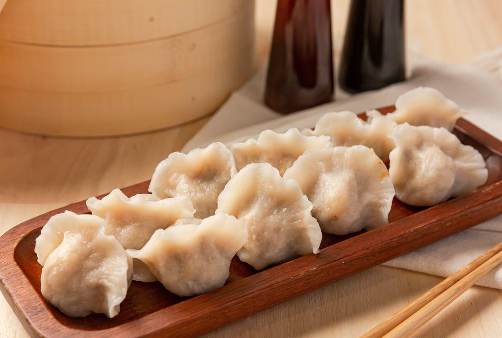 韭菜鲜肉 / Leek ’N Pork Dumplings · Choices of boiled or pan fried.