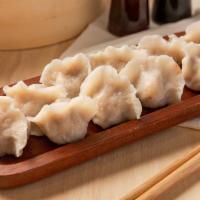 菌菇虾仁鲜肉 / Mushroom, Shrimp ’N Pork Dumplings · Choices of boiled or pan fried.