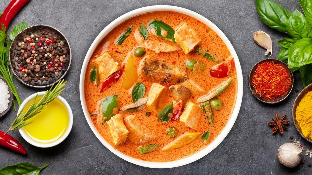 Red Curry Redemption · Coconut milk, bamboo shoot, bell pepper, and eggplant. Choice of protein and a side of rice.  Spicy.