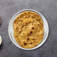 Rockin' Roti · Flat bread with a side of masaman curry.