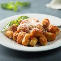 Gnocchi Paesano · Chopped mozzarella, basil, and pomodoro sauce.