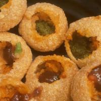 Vegan Pani Puri · Gujarati style puri filled with spiced potatoes and a spicy water mixture. 6 pieces. Vegetar...