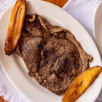 Carne Asada / Grilled Steak · Filete de res a la plancha. Arroz, papas fritas o plátanos maduros. Elección de frijoles o e...