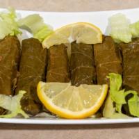 Grape Leaves (6 Pieces) · Vegetarian. Grape leaves stuffed with rice, tomatoes, parsley and cooked in delicious lemon ...