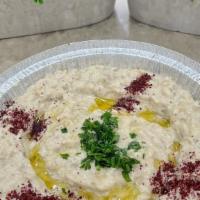 Baba Ghanoush · A mixture of ground chickpeas, tahini, lemon, and olive oil.