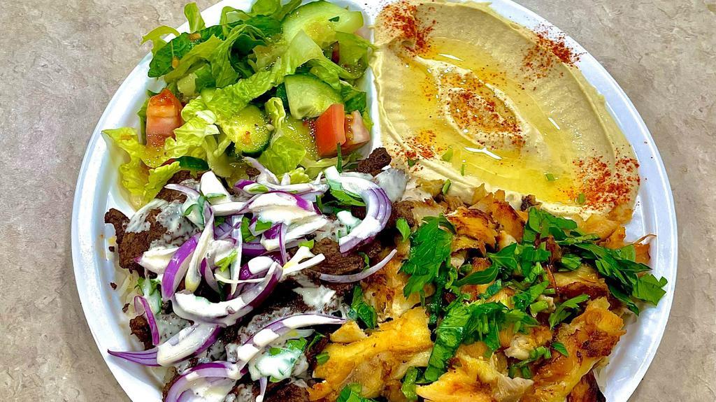 Mixed Platter · Half Chicken shawarma, Half Beef shawarma, served with Basmati sela rice, Salad and Hummus.