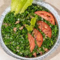 Tabbouleh Salad · Cracked wheat with parsley, tomato's, onions, olive oil, lemon juice.