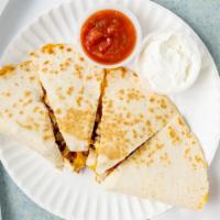 Chicken Quesadilla · Served with sour cream and salsa.
