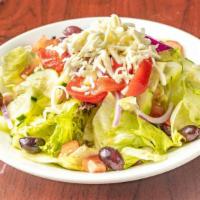 Tossed Salad · Assorted lettuce, tomatoes, cucumbers, shredded mozzarella, roasted red peppers and olives.