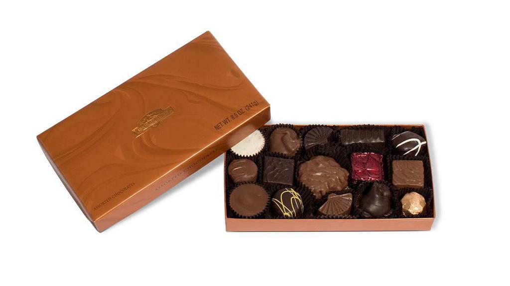 Small Assorted Chocolate Gift Box · A sampling of butter creams, chewy caramels and Peanut Butter Pails™, in rich milk and semi-sweet dark chocolate and white confection. Serving size: 2 pieces
