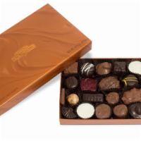 Assorted Chocolate Gift Box · Single layer of nutty clusters, butter creams, chewy caramels and Peanut Butter Pails™ in mi...