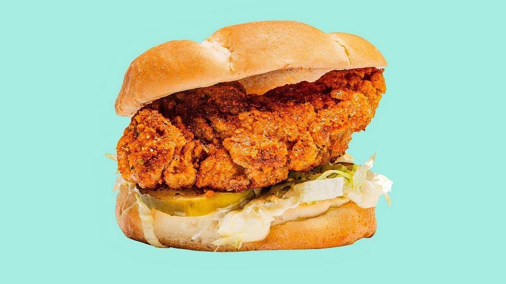 Nashville Hot Chicken Tender Sandwich · With mayo, ketchup, shredded lettuce and pickles.