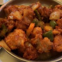 Gobi Manchurian Dry · Spicy. Cauliflower, sautéed in our homemade Szechuan sauce. Served with coconut chutney, sam...