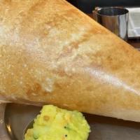 Paper Masala Dosa · Paper dosa filled with spicy onion mashed potato. dosa: crepes served with coconut chutney, ...