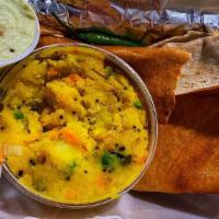 Ghee Masala Dosa · Contains dairy. Ghee crepe with potato masala. Dosa: crepes served with coconut chutney, sam...