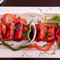 Paneer Tikka · Cubes of Paneer marinated with all the festive flavors cooked to perfection in traditional s...