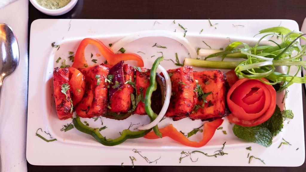 Paneer Tikka · Cubes of Paneer marinated with all the festive flavors cooked to perfection in traditional style Clay Oven