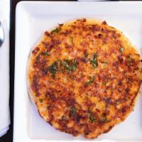 Masala Uthappam · South Indian soft pancake made of rice and lentil topped with onions, tomatoes, green chilie...