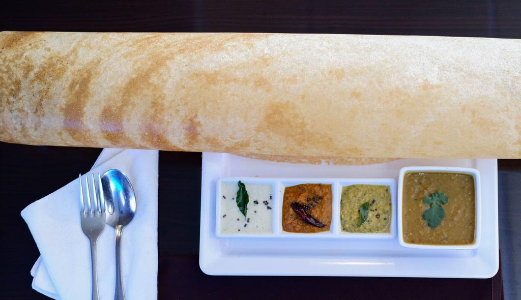 Paper Roast · Classic south Indian crispy thin shaped crepe made of rice and lentil.