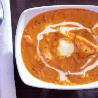 Paneer Makhani · Cottage cheese cubes immersed in a creamy tomato based Indian gravy.