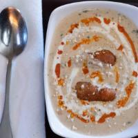 Malai Kofta · Shallow fried shredded cottage cheese dumplings cooked in a rich smooth gravy.