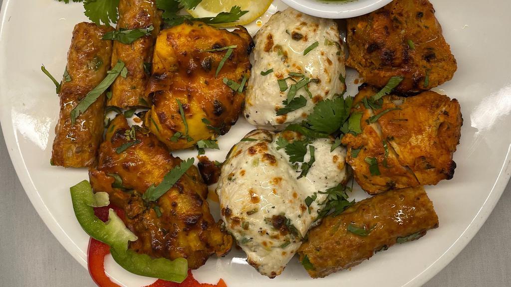Chicken Kebab Platter · An assortment of Chicken Tikka, Chicken Malai, Chicken Seekh and Bombay’s Special Kebab served with mint sauce.