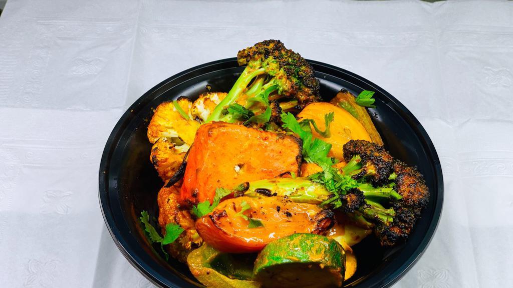 Tandoori Mix Vegetable Platter · Exotic combination of mixed vegetable cooked in clay oven.