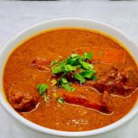 Lamb Vindaloo · Spicy. Lamb cooked in a fiery and tangy sauce.