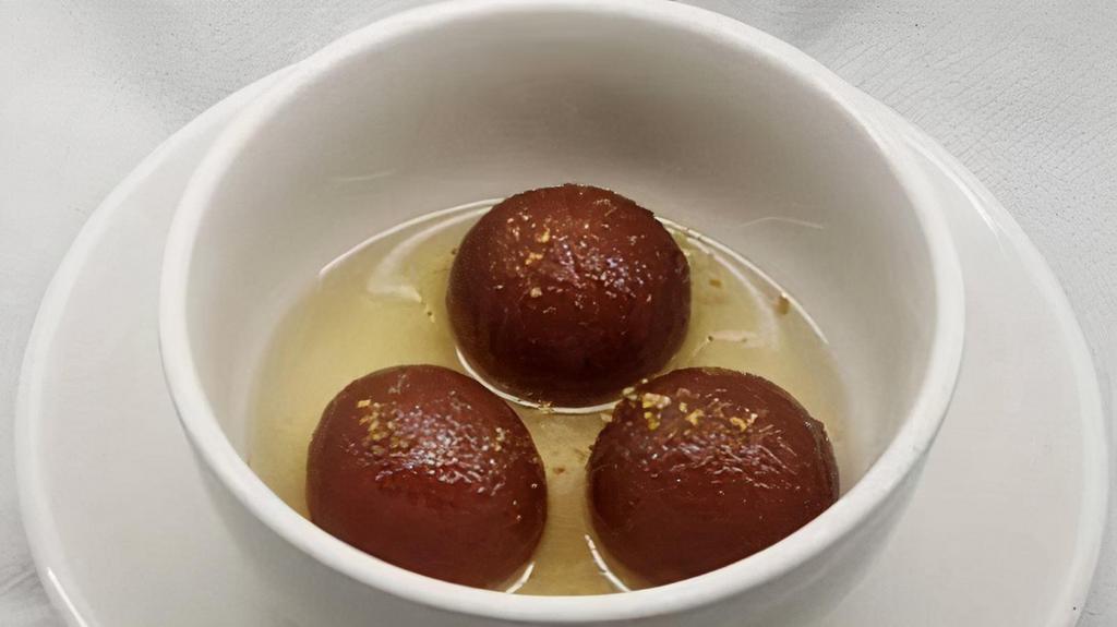 Gulab Jamun · Light pastry made from dry milk and honey.