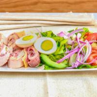 Chef'S Salad · Sliced roast turkey, boiled ham, roast beef, Swiss and American cheese, sliced egg and tomat...