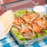 Gyro Salad · Marinated slices of beef and lamb, topped with lettuce, tomato, and onion. Served with tzatz...