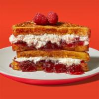 Ricotta Jelly Stuffed French Toast · Four slices of egg-washed french toast stuffed with ricotta and jelly and topped with maple ...