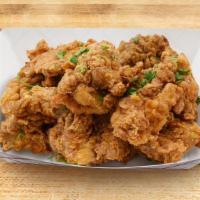 Chicken Thigh (8 Pc) · 8 piece crunchy chicken thighs with your choice of two sauces.
