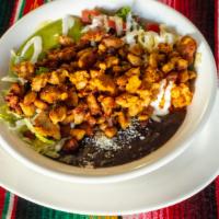 Burritos Bowls · Rice beans lettuce guacamole pico  cream  chips