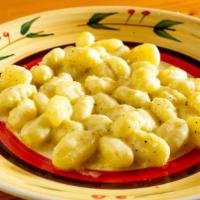 Gnocchi Al Gorgonzola · Potatoes ricotta gorgonzola dolce cheese sauce.