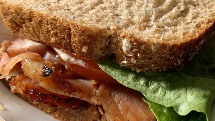 Honey Glazed Ham Sandwich · With mayo, honey mustard, lettuce and tomato. Choice of bread: French, honey oat, whole wheat, or croissant.