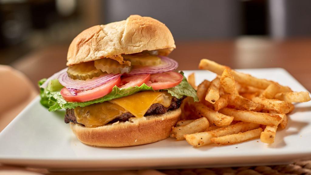 Garden Burger · Vegetarian. Vegetarian veggie burger, avocado, arugula, tomato and onion on a sesame seed bun.