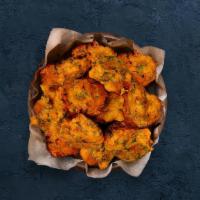 Veg Pakodi · Perfectly fried assortment of battered farm-fresh vegetables and herbs.