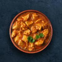 Chicken Chettinad · Tender chicken cooked in a sauce made with traditional Indian herbs and coconut milk.