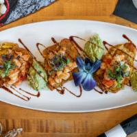 Montaditos De Camarones (Shrimp) · Tostones (fried plantain) topped fresh garlic shrimp.