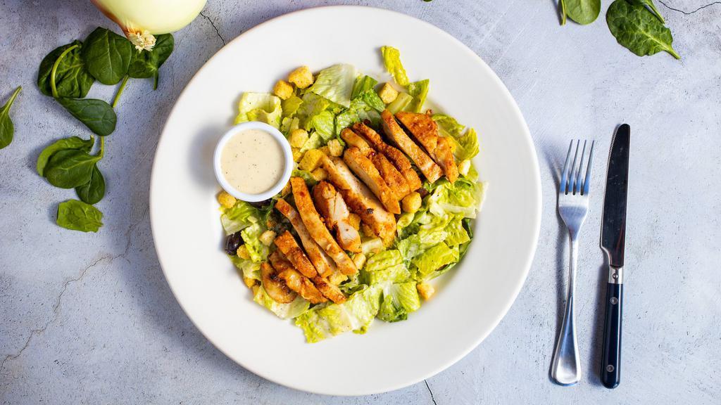 Chicken Caesar Wrap · Grilled chicken or crispy chicken, romaine lettuce, Caesar dressing and homemade croutons.